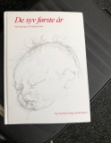 De syv første år